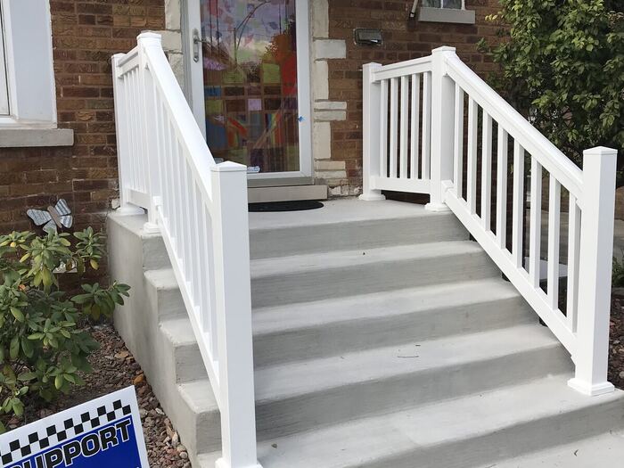 Front porch steps with new railing