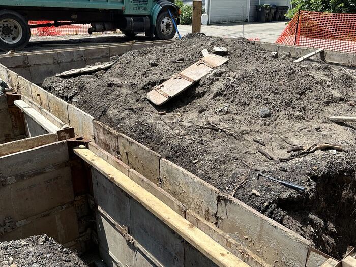 Foundation wall forms set and braced