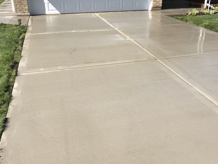 Finished driveway leading to the garage