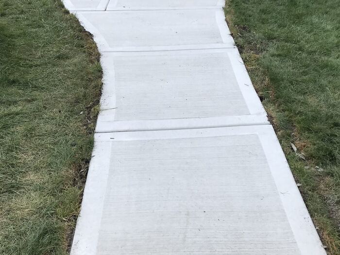 Wide walkway up to the front stairs