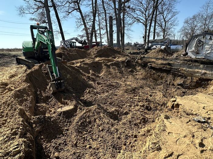 Excavating trenches for new footings